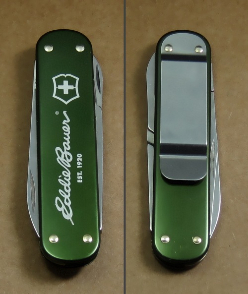 Advertising knife for Eddie Bauer with dark olive green anodising.
