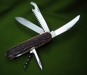 Victorinox Hunter from the 108mm Safari Series, with initiation stag scales and plain-edge gutting blade.