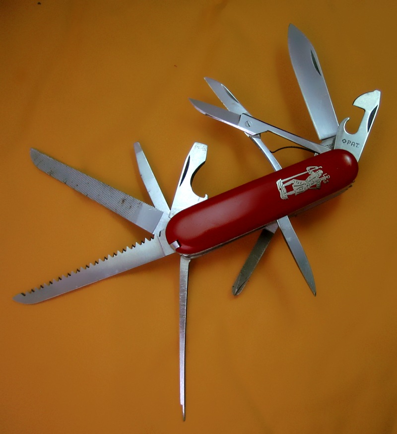 Victorinox model known as the Luxury Edition of the Automobile knife (or Luxury Automobile for short).
Adds the scissors and saw to the base model. 
