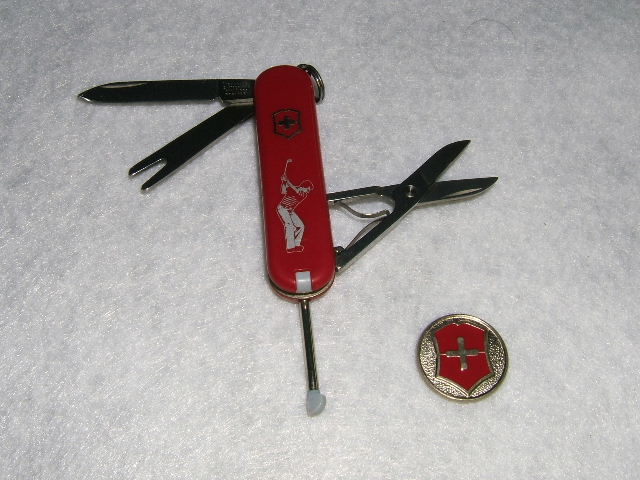 A 58mm Victorinox Golfer with separate Golf Ball Marker.