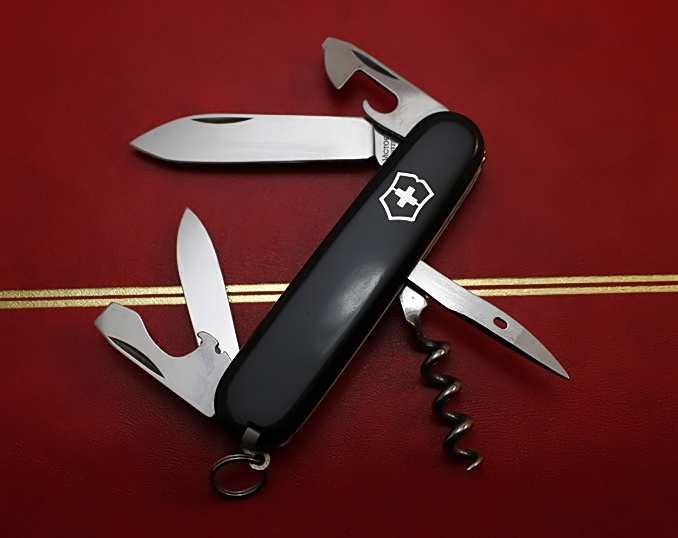 A Victorinox Tourist with black scales same as a Spartan but in 84mm
