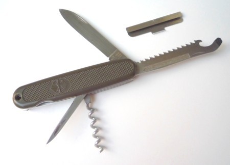 This Victorinox German Army Knife(GAK) is a later revision, sometimes referred to as the GAK-2, because it has the nail-file/match-striker textured area on the size of the saw/combo-opener tool.