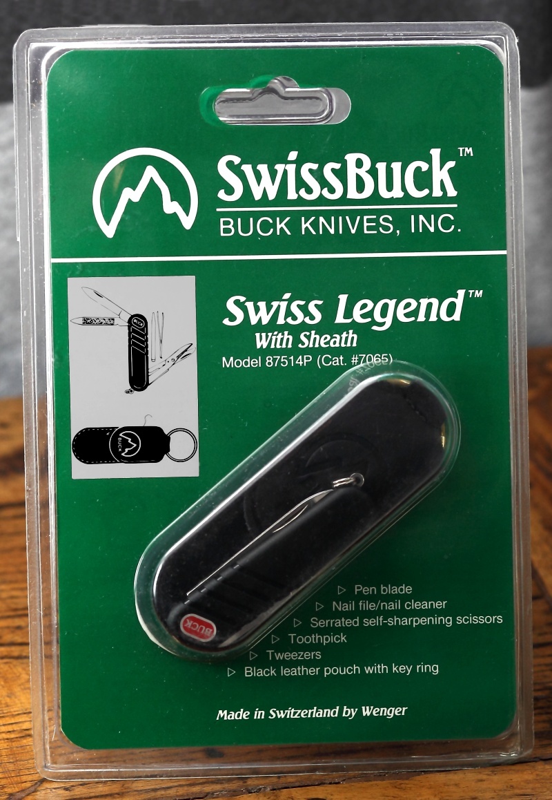 A SwissBuck Swiss Legend model in rack mount blister packaging with keychain pouch.