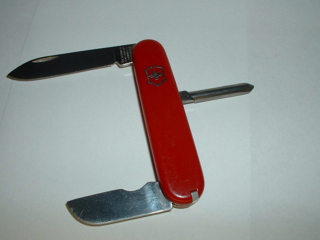 This is a red cellidor handled 84mm Electrician model.