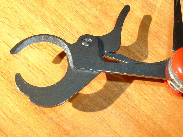 Close up of the Wenger Cigar Cutter bypass shears found on several Wenger knives. It operates off the main knife back spring just like the Wenger scissors do.