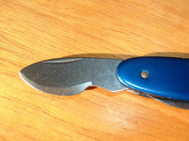 close up of the Wenger version of a watch case opener blade