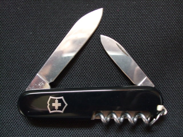 This is a discontinued model with very nice newer Black scales.