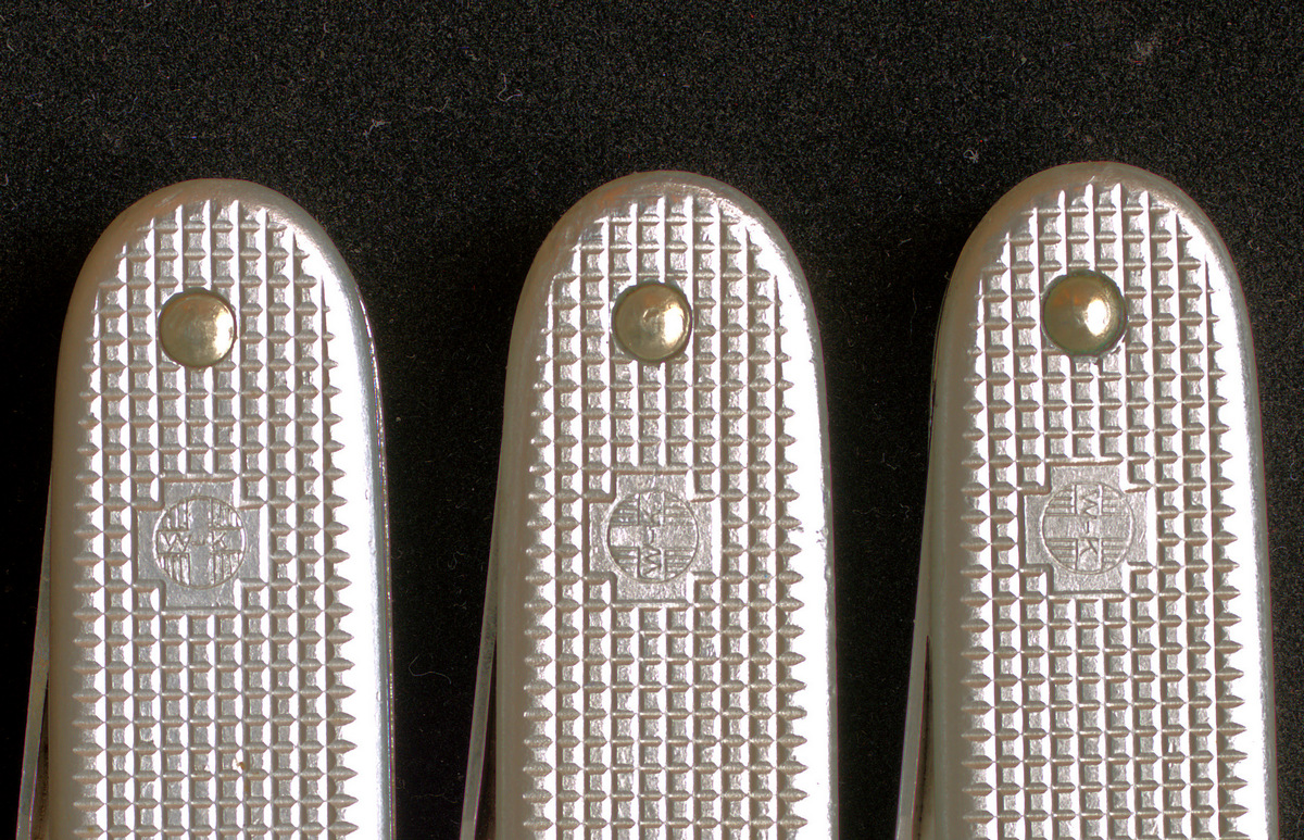 Fig. 11. Different WK marks orientation on soldier knives manufactured in 1968, 1971 and 1974