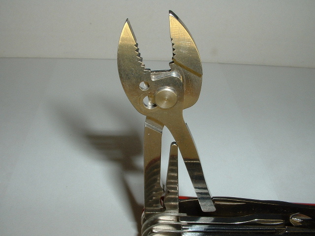 Wenger style pliers shown in the opened position. The slip joint on these makes the jaws able to open up much wider than their Victorinox counterpart.