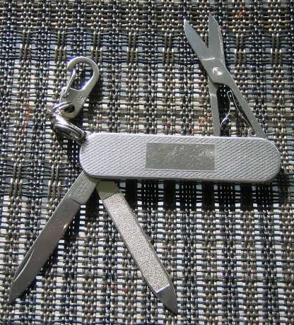 Victorinox Broker, 58mm Stainless Steel with engraving panel and keyring.