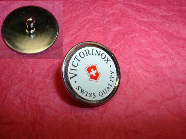 This is the Golf Tool version of the Victorinox golf ball marker.